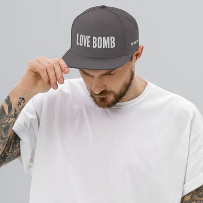 THE DARK TRIAD: LOVE BOMB Snapback Hat